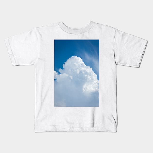 Rising storm cloud and blue sky scape Kids T-Shirt by Juhku